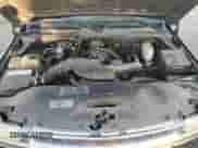 2004 Chevrolet Suburban LS z VIN 1GNEC16T14J166376, wystawiony jako Copart lot #79178174 z przebiegiem 141 700 mil mil oraz Szkoda całkowita • Salvage title. Historia ofert i sprzedaży dostępna na DreamBid. Obrazek 12.