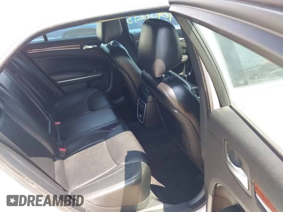 2013 Chrysler 300 with VIN 2C3CCARGXDH669215, listed as a IAAI auction lot 42458243 with 156,880 mi miles and . Bid and sale history available at DreamBid. Image 8.