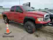 2004 Dodge 2500 SLT with VIN 3D7KU28C54G183409, listed as a Copart auction lot 56891715 with 236,263 mi miles and Salvage title. Bid and sale history available at DreamBid. Image 4.