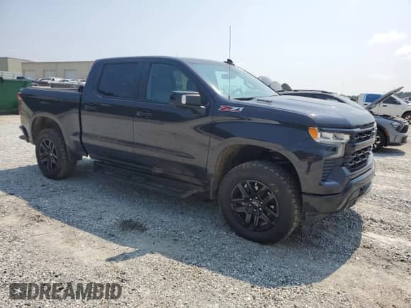 2022 Chevrolet Silverado 1500 RST with VIN 3GCUDEET3NG662986, listed as a Copart auction lot 59013585 with 26,141 mi miles and Salvage title. Bid and sale history available at DreamBid. Image 4.