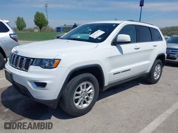 2020 Jeep Grand Cherokee Laredo E z VIN 1C4RJFAG4LC292886, wystawiony jako IAAI lot #42037431 z przebiegiem 79 923 mil mil oraz . Historia ofert i sprzedaży dostępna na DreamBid. Obrazek 2.