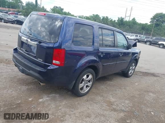 2014 Honda Pilot EX-L with VIN 5FNYF4H74EB025132, listed as a IAAI auction lot 42740970 with 112,397 mi miles and . Bid and sale history available at DreamBid. Image 4.