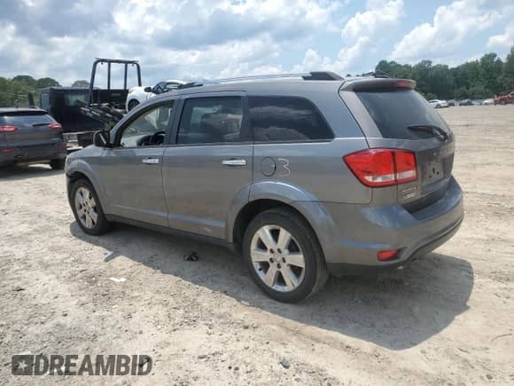 2012 Dodge Journey Crew with VIN 3C4PDCDG0CT159507, listed as a Copart auction lot 61588405 with 173,444 mi miles and Clean title. Bid and sale history available at DreamBid. Image 2.
