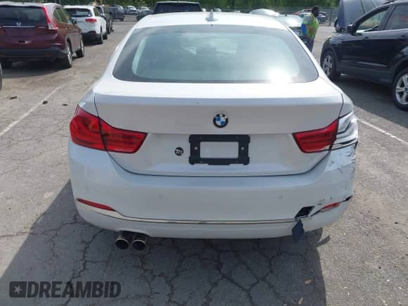 2019 BMW 4 Series 430i xDrive z VIN WBA4J3C55KBL08387, wystawiony jako IAAI lot #42248405 z przebiegiem 115 017 mil mil oraz . Historia ofert i sprzedaży dostępna na DreamBid. Obrazek 19.