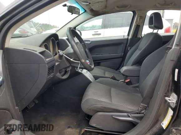 2009 Dodge Caliber SXT z VIN 1B3HB48A59D104346, wystawiony jako Copart lot #81551775 z przebiegiem 211 208 mil mil oraz Szkoda całkowita • Salvage title. Historia ofert i sprzedaży dostępna na DreamBid. Obrazek 7.