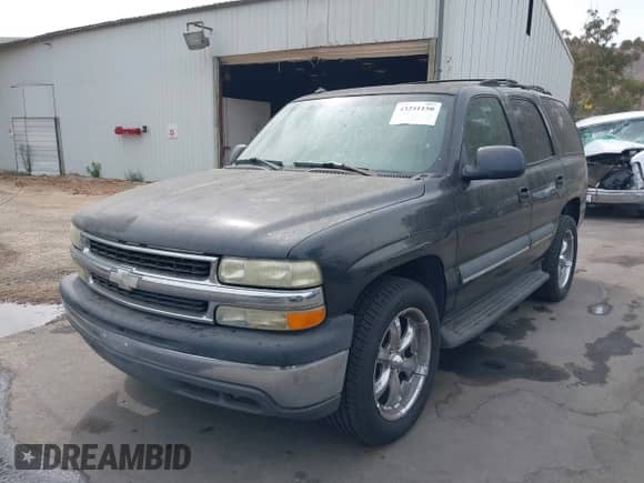 2003 Chevrolet Tahoe LS z VIN 1GNEC13T73R166712, wystawiony jako IAAI lot #43251150 z przebiegiem 243 592 mil mil oraz . Historia ofert i sprzedaży dostępna na DreamBid. Obrazek 2.