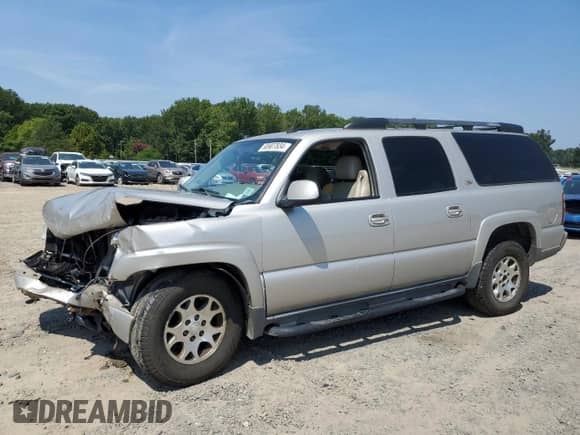 2004 Chevrolet Suburban Z71 z VIN 3GNFK16Z74G305505, wystawiony jako Copart lot #68907834 z przebiegiem Nie podano mil oraz Szkoda całkowita • Salvage title. Historia ofert i sprzedaży dostępna na DreamBid. Obrazek 1.