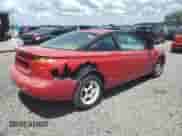 2001 Saturn SC with VIN 1G8ZY12791Z233074, listed as a Copart auction lot 60476085 with 130,323 mi miles and Salvage title. Bid and sale history available at DreamBid. Image 3.