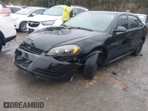 2009 Chevrolet Impala Police Police with VIN 2G1WS57M691253263, listed as a IAAI auction lot 41103398 with 144,247 mi miles and . Bid and sale history available at DreamBid. Image 17.