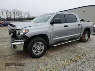 2020 Toyota Tundra SR5 with VIN 5TFEY5F13LX263719, listed as a Copart auction lot 88021605 with 111,563 mi miles and Salvage title. Bid and sale history available at DreamBid. Image 1.