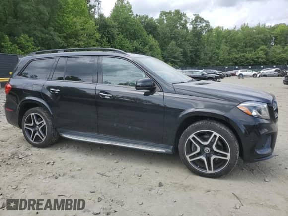 2019 Mercedes-Benz GLS 550 with VIN 4JGDF7DE2KB223383, listed as a Copart auction lot 59771305 with 66,193 mi miles and Salvage title. Bid and sale history available at DreamBid. Image 4.