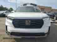 2023 Honda Pilot Touring с VIN 5FNYG2H71PB002492, выставлен на аукционе Copart как лот 41790915 с пробегом 18 450 миль миль и Списание • Salvage title. История ставок и продаж доступна на DreamBid. Изображение 5.