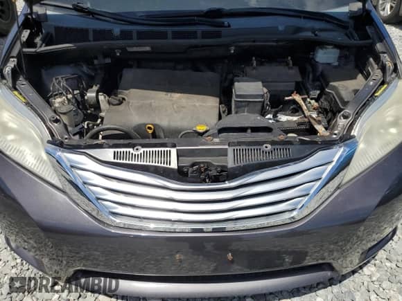 2012 Toyota Sienna XLE z VIN 5TDDK3DC0CS047130, wystawiony jako Copart lot #65435615 z przebiegiem 128 016 mil mil oraz Czysty tytuł • Clean title. Historia ofert i sprzedaży dostępna na DreamBid. Obrazek 12.