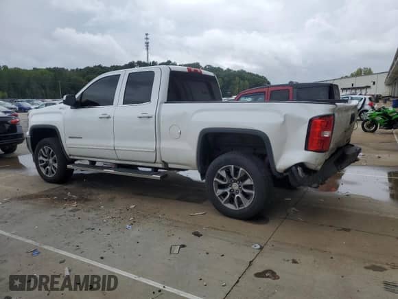 2018 GMC Sierra 1500 SLE z VIN 1GTV2MEC9JZ202522, wystawiony jako Copart lot #81724875 z przebiegiem 264 744 mil mil oraz Szkoda całkowita • Salvage title. Historia ofert i sprzedaży dostępna na DreamBid. Obrazek 2.