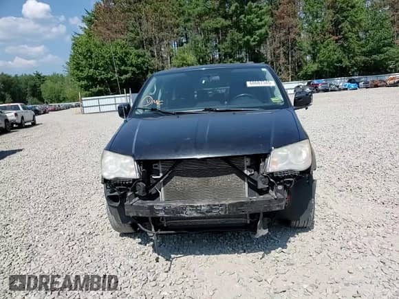 2013 Dodge Grand Caravan SXT with VIN 2C4RDGCGXDR718759, listed as a Copart auction lot 68687345 with 196,834 mi miles and Salvage title. Bid and sale history available at DreamBid. Image 14.