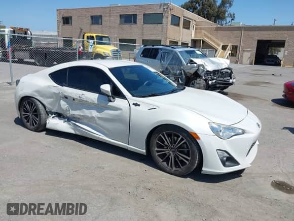 2014 Scion FR-S z VIN JF1ZNAA12E8707315, wystawiony jako IAAI lot #42087736 z przebiegiem 88 157 mil mil oraz . Historia ofert i sprzedaży dostępna na DreamBid. Obrazek 1.