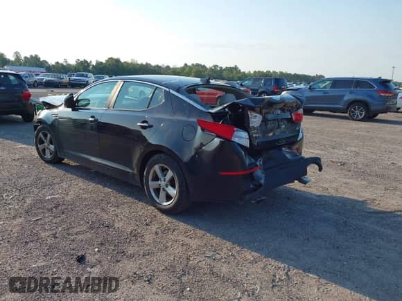 2015 Kia Optima LX with VIN 5XXGM4A7XFG463907, listed as a IAAI auction lot 43085364 with 122,090 mi miles and . Bid and sale history available at DreamBid. Image 3.