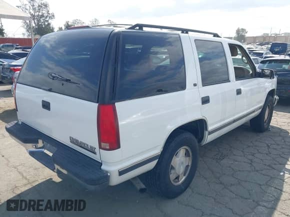 1997 Chevrolet Tahoe with VIN 1GNEK13RXVJ428831, listed as a IAAI auction lot 43348161 with 162,463 mi miles and . Bid and sale history available at DreamBid. Image 4.