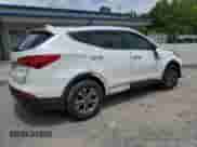 2016 Hyundai Santa Fe z VIN 5XYZU3LB5GG359729, wystawiony jako Copart lot #64553135 z przebiegiem 111 880 mil mil oraz Szkoda całkowita • Salvage title. Historia ofert i sprzedaży dostępna na DreamBid. Obrazek 3.