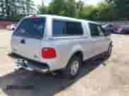 2002 Ford F-150 XLT with VIN 1FTRW07602KB73444, listed as a IAAI auction lot 42744286 with 208,152 mi miles and . Bid and sale history available at DreamBid. Image 4.