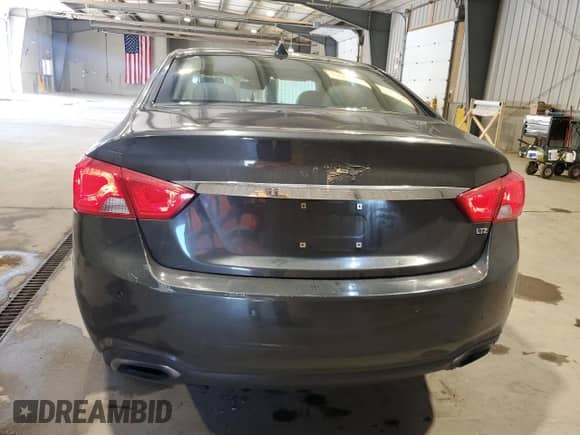 2014 Chevrolet Impala LTZ с VIN 1G1145SL7EU107908, выставлен на аукционе Copart как лот 82223255 с пробегом 127 008 миль миль и Списание • Salvage title. История ставок и продаж доступна на DreamBid. Изображение 6.