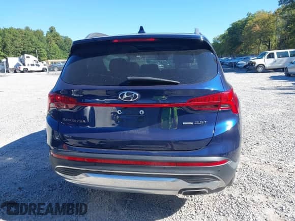 2022 Hyundai Santa Fe Limited z VIN 5NMS4DAL8NH402319, wystawiony jako IAAI lot #43341539 z przebiegiem 43 410 mil mil oraz . Historia ofert i sprzedaży dostępna na DreamBid. Obrazek 16.