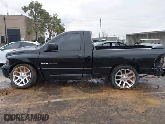 2004 Dodge RAM with VIN 3D3HA16H34G269900, listed as a IAAI auction lot 41715461 with 70,182 mi miles and . Bid and sale history available at DreamBid. Image 15.