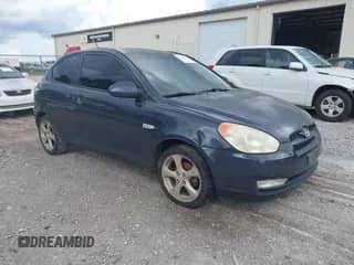 2008 Hyundai Accent SE z VIN KMHCN36C18U061231, wystawiony jako IAAI lot #42698951 z przebiegiem 165 440 mil mil oraz . Historia ofert i sprzedaży dostępna na DreamBid. Obrazek 1.