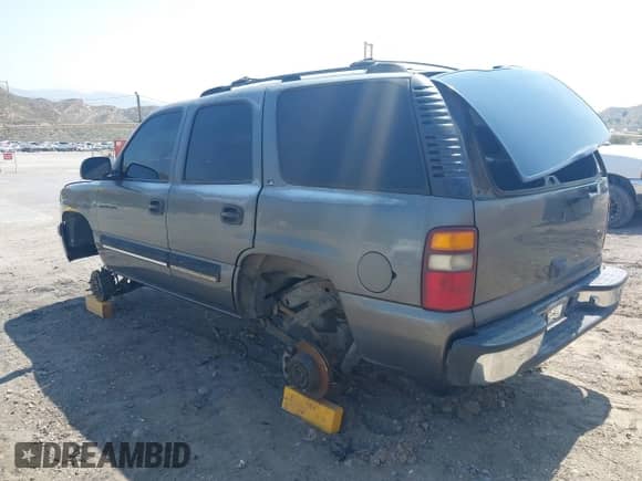 2001 Chevrolet Tahoe LS with VIN 1GNEC13T51J153677, listed as a IAAI auction lot 42459552 with 201,209 mi miles and . Bid and sale history available at DreamBid. Image 3.