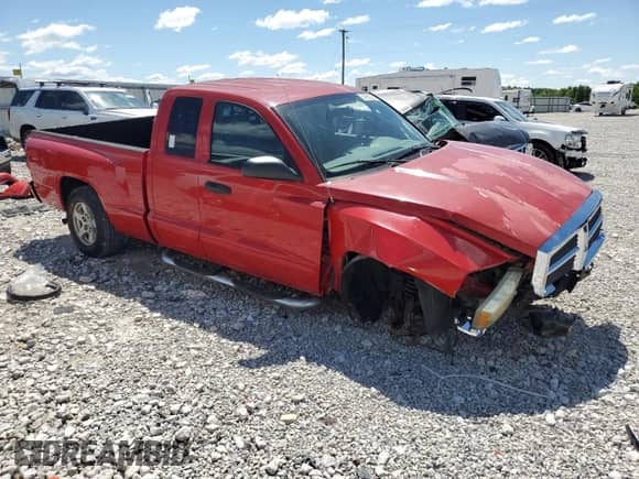 2005 Dodge Dakota SLT с VIN 1D7HE42N75S149298, выставлен на аукционе Copart как лот 57951265 с пробегом 171 884 миль миль и Списание • Salvage title. История ставок и продаж доступна на DreamBid. Изображение 4.