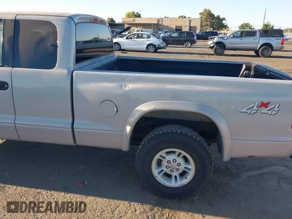 1999 Dodge Dakota SLT с VIN 1B7GG22Y9XS165164, выставлен на аукционе IAAI как лот 42904277 с пробегом 194 835 миль миль и . История ставок и продаж доступна на DreamBid. Изображение 6.