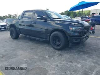 2021 Ram 1500 Big Horn z VIN 1C6RREFT1MN543109, wystawiony jako IAAI lot #43065345 z przebiegiem 69 442 mil mil oraz . Historia ofert i sprzedaży dostępna na DreamBid. Obrazek 1.