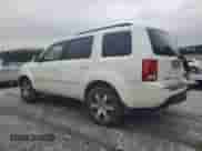 2014 Honda Pilot Touring with VIN 5FNYF4H97EB041584, listed as a Copart auction lot 66761435 with 121,127 mi miles and Salvage title. Bid and sale history available at DreamBid. Image 2.