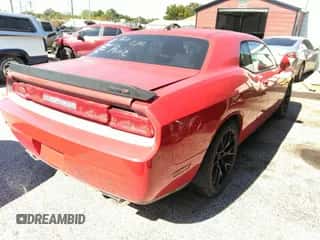 2010 Dodge Challenger SRT-8 with VIN 2B3CJ7DW4AH238109, listed as a IAAI auction lot 43482689 with 130,832 mi miles and . Bid and sale history available at DreamBid. Image 4.