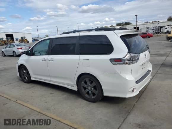 2015 Toyota Sienna SE with VIN 5TDXK3DC8FS656354, listed as a Copart auction lot 86177875 with 192,471 mi miles and Salvage title. Bid and sale history available at DreamBid. Image 2.