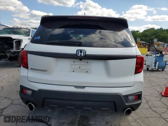 2022 Honda Passport EX-L with VIN 5FNYF7H56NB004766, listed as a Copart auction lot 56058495 with Not provided miles and Salvage title. Bid and sale history available at DreamBid. Image 6.