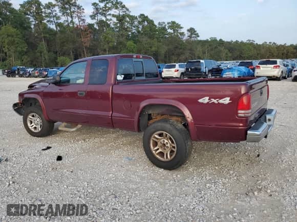 2003 Dodge Dakota с VIN 1D7HG42XX3S197550, выставлен на аукционе Copart как лот 79550024 с пробегом 70 997 миль миль и Списание • Salvage title. История ставок и продаж доступна на DreamBid. Изображение 2.