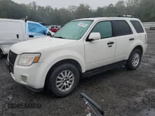 2010 Mercury Mariner Premier with VIN 4M2CN9HG1AKJ28171, listed as a Copart auction lot 80882805 with 124,347 mi miles and Salvage title. Bid and sale history available at DreamBid. Image 1.