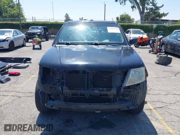 2014 Nissan Frontier SV with VIN 1N6AD0ER0EN737884, listed as a IAAI auction lot 42499078 with 165,060 mi miles and . Bid and sale history available at DreamBid. Image 13.