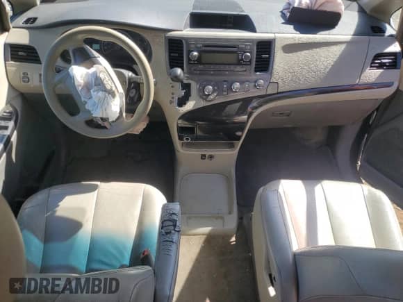 2012 Toyota Sienna with VIN 5TDZK3DC4CS184450, listed as a Copart auction lot 71284385 with 207,878 mi miles and Salvage title. Bid and sale history available at DreamBid. Image 8.