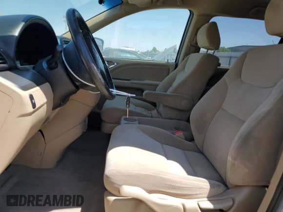 2005 Honda Odyssey LX with VIN 5FNRL38295B101522, listed as a Copart auction lot 65648685 with 148,852 mi miles and Salvage title. Bid and sale history available at DreamBid. Image 7.