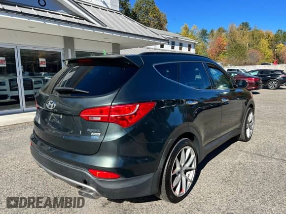 2013 Hyundai Santa Fe Sport z VIN 5XYZUDLB2DG042122, wystawiony jako Copart lot #89916455 z przebiegiem 245 302 mil mil oraz Czysty tytuł • Clean title. Historia ofert i sprzedaży dostępna na DreamBid. Obrazek 4.