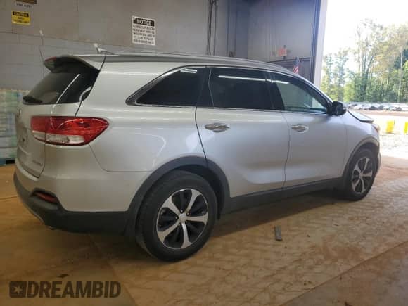 2016 Kia Sorento EX with VIN 5XYPH4A19GG041737, listed as a Copart auction lot 85142065 with 120,012 mi miles and Salvage title. Bid and sale history available at DreamBid. Image 3.