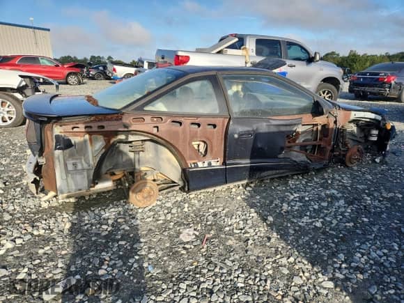 1994 Saturn SC with VIN 1G8ZG1575RZ133631, listed as a Copart auction lot 85352545 with 84,474 mi miles and Salvage title. Bid and sale history available at DreamBid. Image 3.
