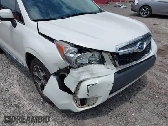 2016 Subaru Forester XT Touring z VIN JF2SJGXC4GH486064, wystawiony jako IAAI lot #42801023 z przebiegiem 134 785 mil mil oraz . Historia ofert i sprzedaży dostępna na DreamBid. Obrazek 6.