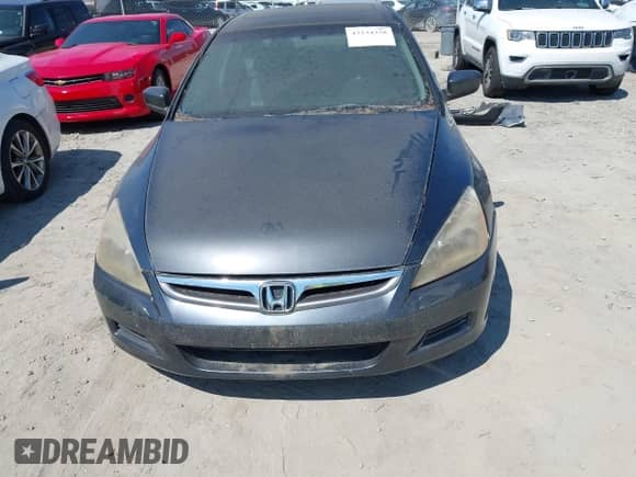 2006 Honda Accord EX-L with VIN 1HGCM66506A011205, listed as a IAAI auction lot 43234358 with 345,843 mi miles and . Bid and sale history available at DreamBid. Image 6.