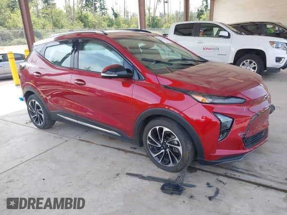 2022 Chevrolet Bolt EUV Premier z VIN 1G1FZ6S00N4117733, wystawiony jako IAAI lot #42504454 z przebiegiem 74 647 mil mil oraz . Historia ofert i sprzedaży dostępna na DreamBid. Obrazek 1.