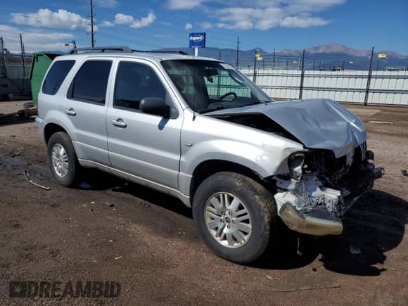 2007 Mercury Mariner Premier with VIN 4M2CU97137KJ04575, listed as a Copart auction lot 70735655 with 91,350 mi miles and Salvage title. Bid and sale history available at DreamBid. Image 4.