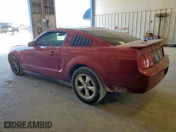 2008 Ford Mustang Deluxe with VIN 1ZVHT80N985106463, listed as a Copart auction lot 68001835 with 208,220 mi miles and Salvage title. Bid and sale history available at DreamBid. Image 2.
