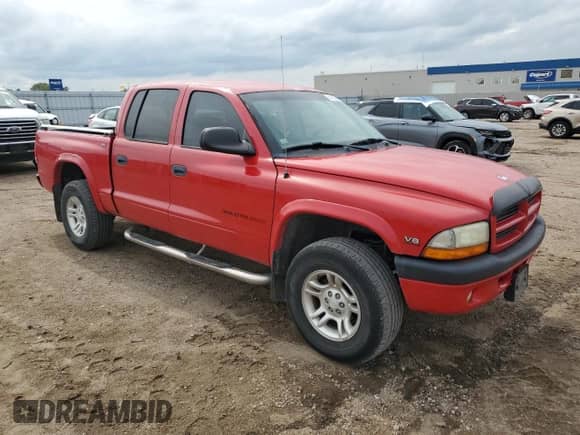 2002 Dodge Dakota Sport with VIN 1B7HG38N52S721308, listed as a Copart auction lot 81450285 with 126,552 mi miles and Clean title. Bid and sale history available at DreamBid. Image 4.